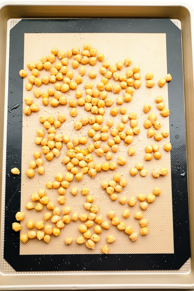 seasoned chickpeas on a baking sheet
