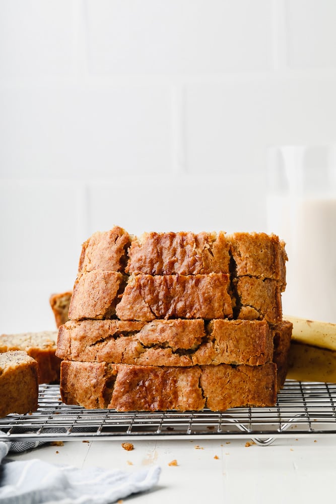 slices of banana bread on a cooling rack.