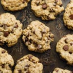 rows of baked oatmeal chocolate chip cookies on a baking sheet