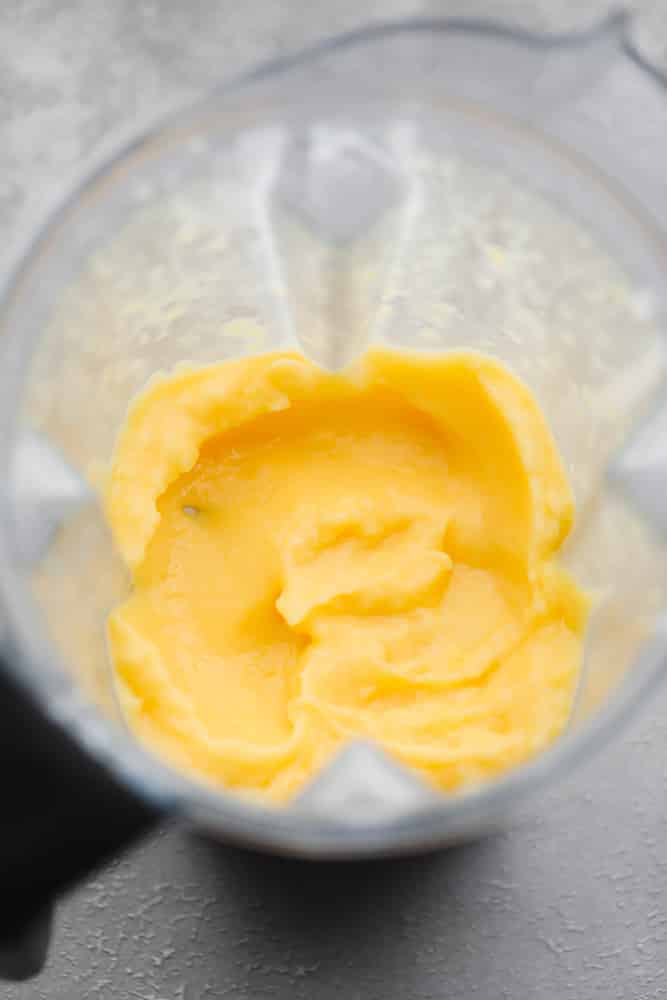 blended yellow mango puree in a blender