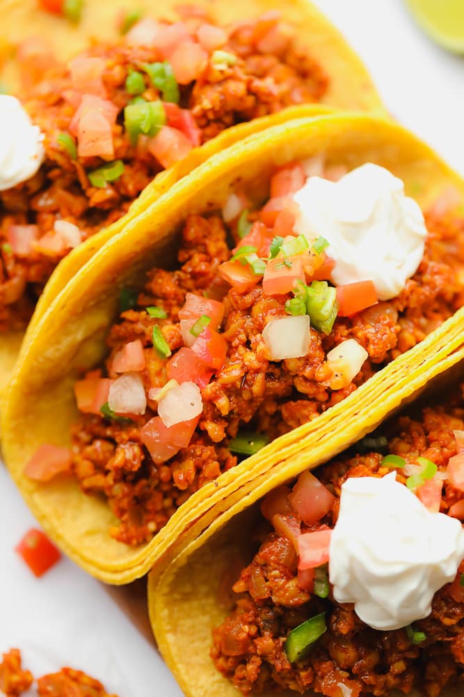 close up on 3 corn tortilla tempeh tacos