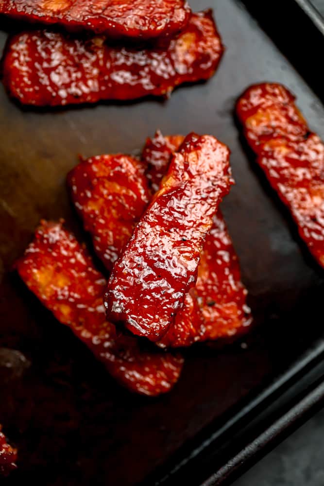 few pieces of cooked bbq tempeh ribs