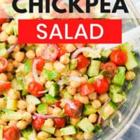 pinterest image of a chickpea salad with chopped vegetables in a glass bowl