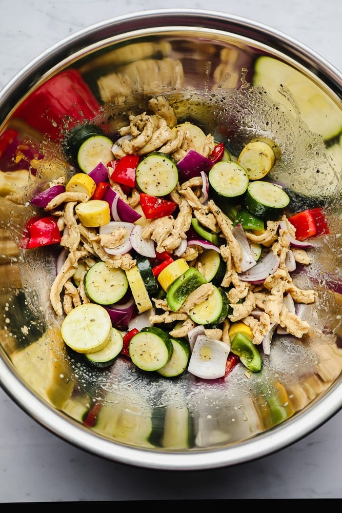 metal bowl with chopped vegetables and soy curls