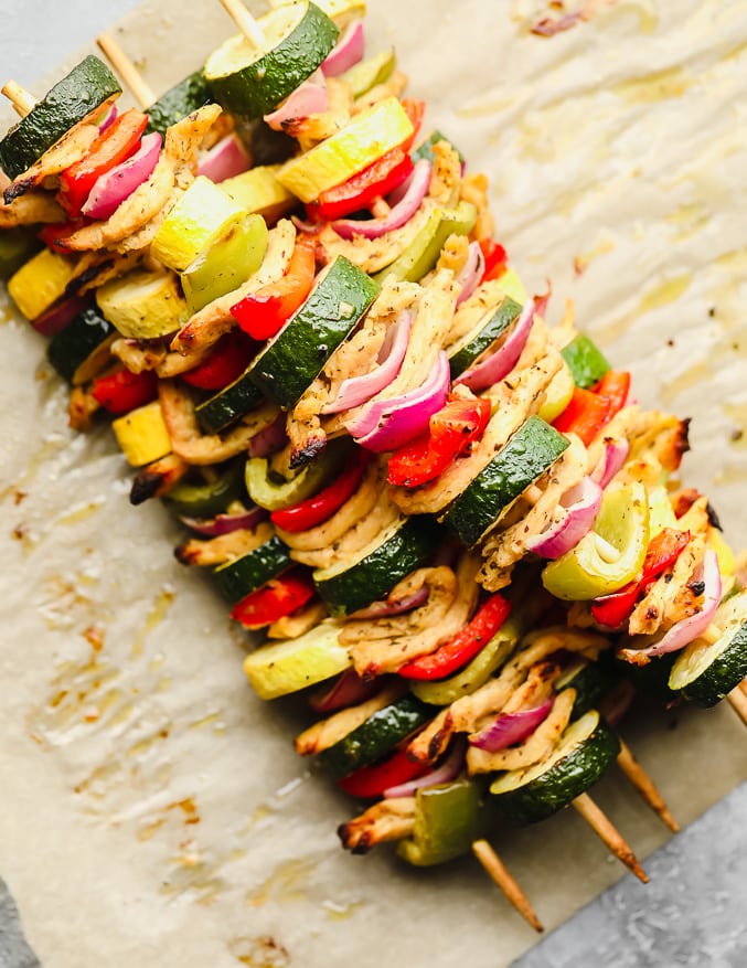 cooked vegetable kebabs piled on top of each other