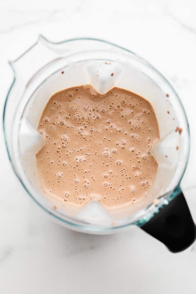 bubbly chocolate liquid in a blender