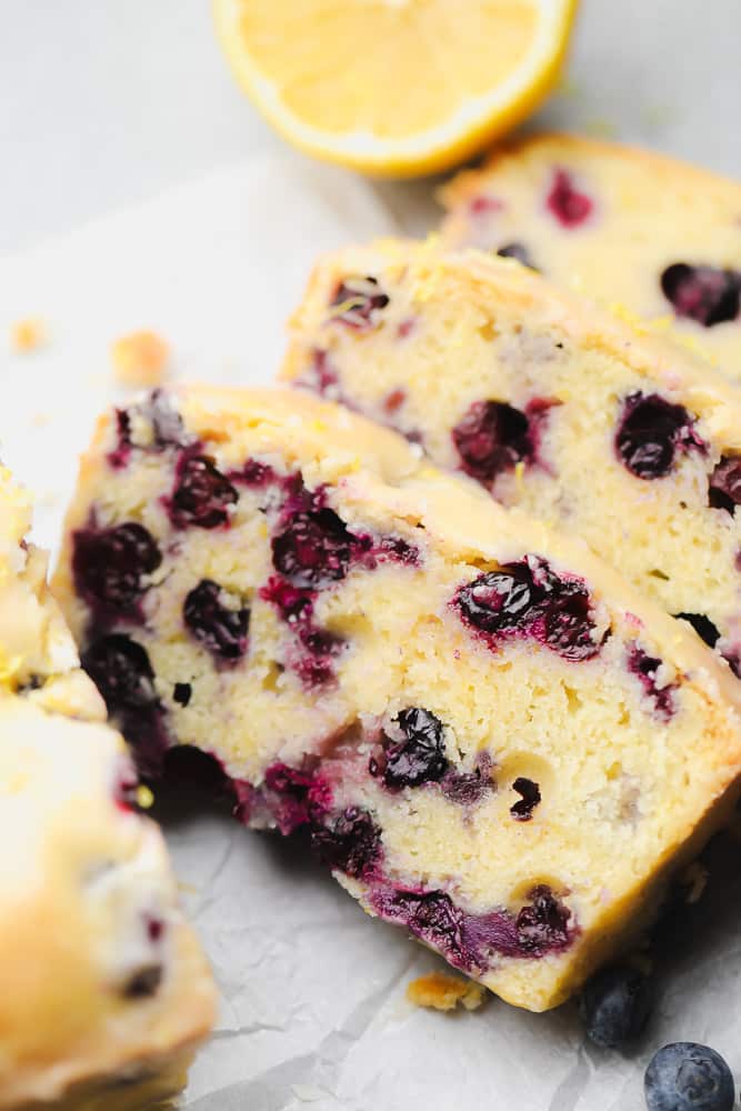 close up on 3 slices of blueberry and lemon bread