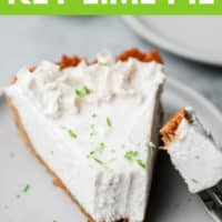 pinterest image of a close up on a slice of white key lime pie with a fork taking a bite