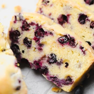 close up on 2 slices of blueberry and lemon bread