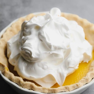 square image with meringue from aquafaba on a pie