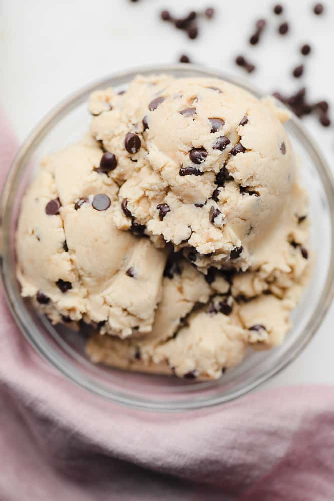 scoops of chocolate chip cookie dough in a glass bowl