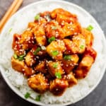 square image of tofu over rice