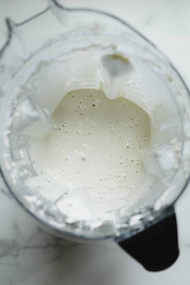 blended cashews and water, looks like cream in a blender