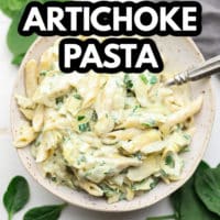 pinterest image with text overlay for spinach artichoke pasta