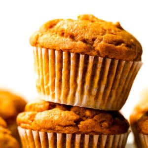 square image of muffin on top of another orange muffin
