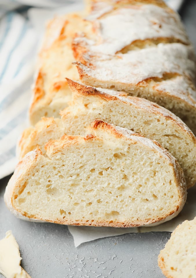 2 slices cut from a loaf of baked bread.