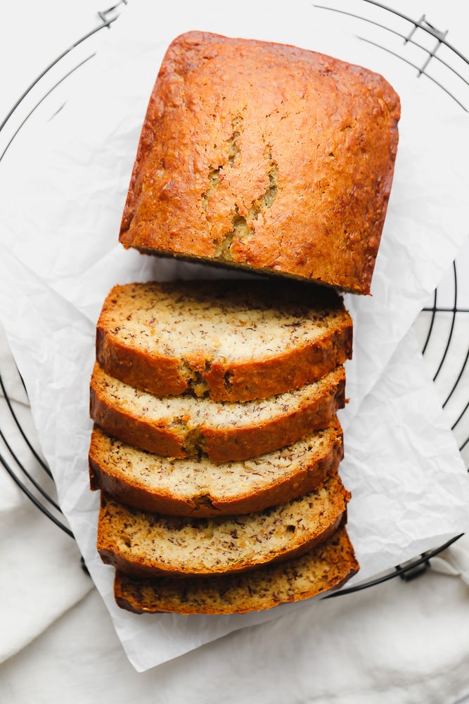 looking down on a loaf of bread sliced about halfway through