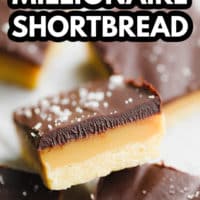 pinterest image of a cookie bar with layers of shortbread, caramel, and chocolate.