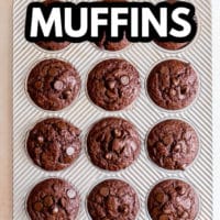 pinterest image of baked chocolate muffins in a metal baking tin.