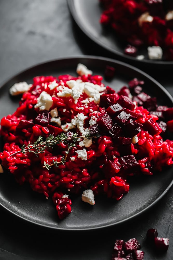 close up shot of beetroot risotto and roasted beets and cheese