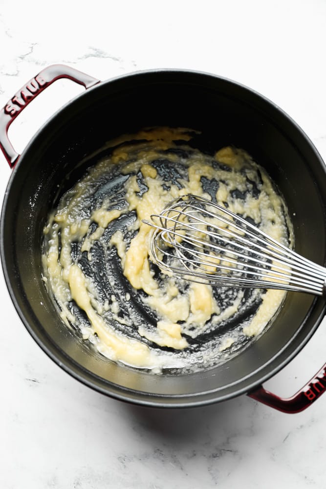whisking flour, butter in a pot
