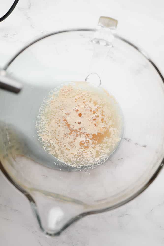 liquid with bubbles in glass mixing bowl