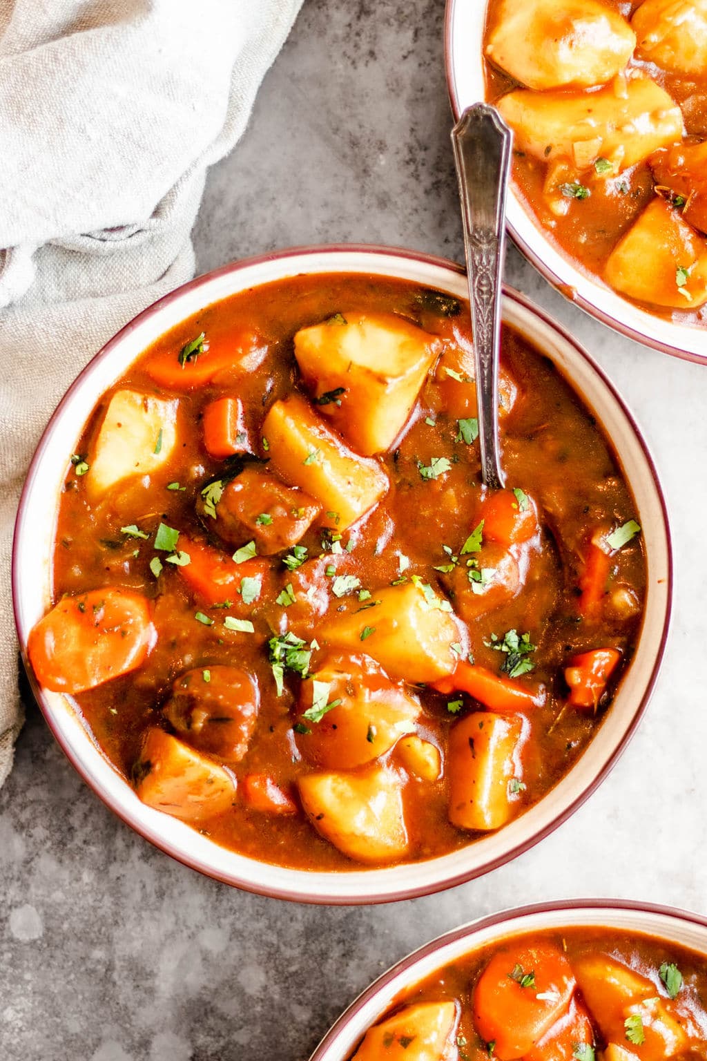 bowls filled with vegan irish stew.