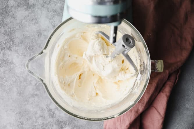 mixing bowl with creamy white frosting