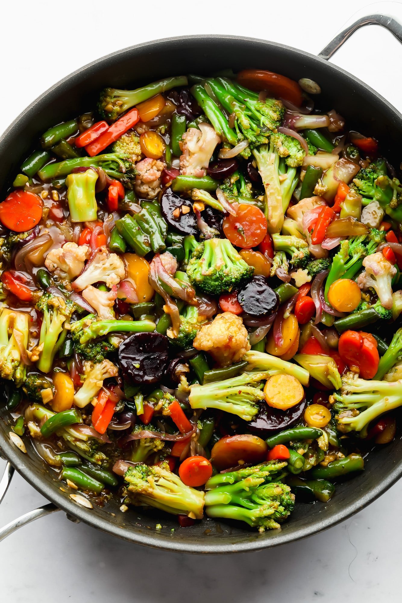 https://www.noracooks.com/wp-content/uploads/2022/04/frozen-vegetable-stir-fry-4.jpg