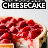 pinterest image of a vegan strawberry cheesecake with a slice cut out.