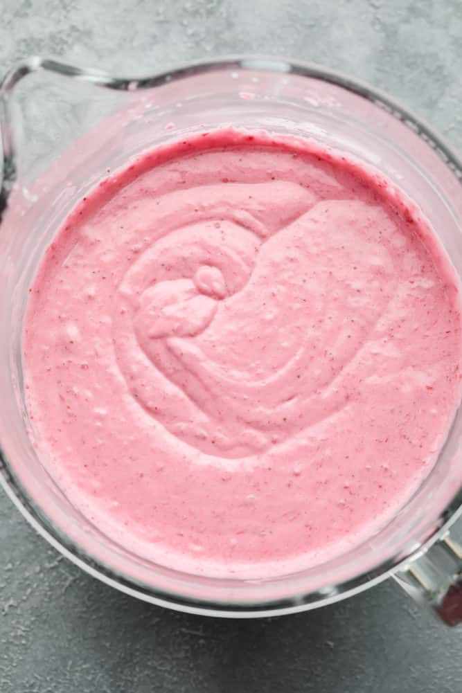 cake batter, pink, in a glass mixing bowl