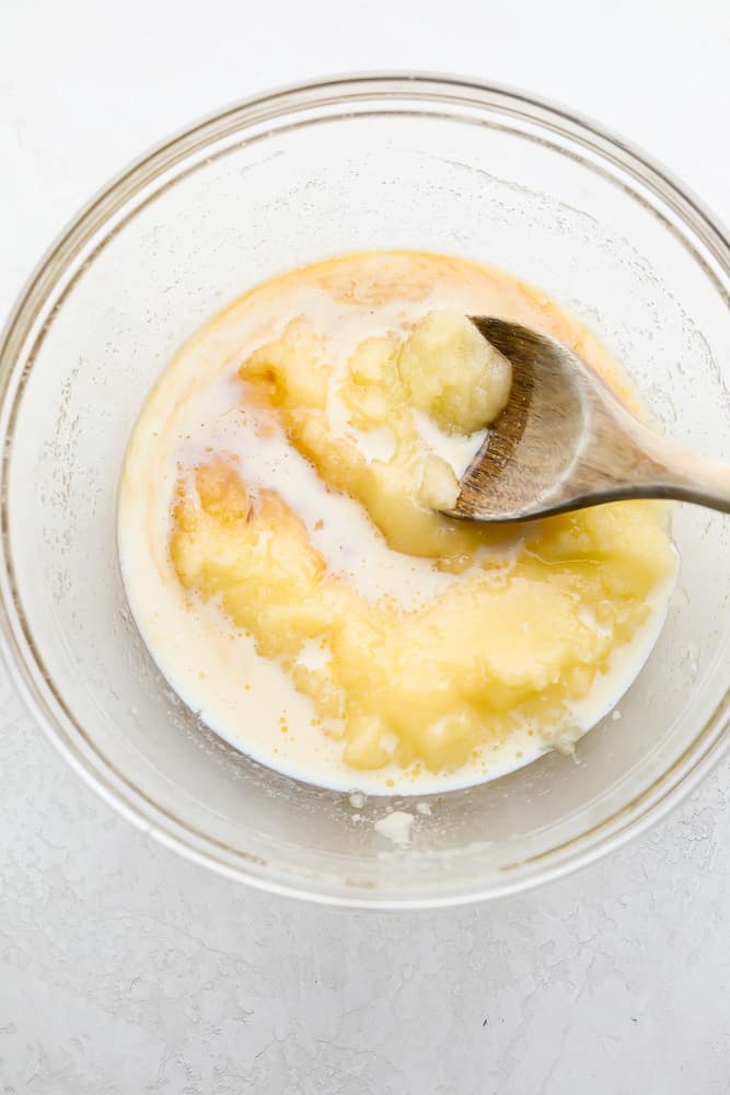 milk added to bowl with sugar and butter