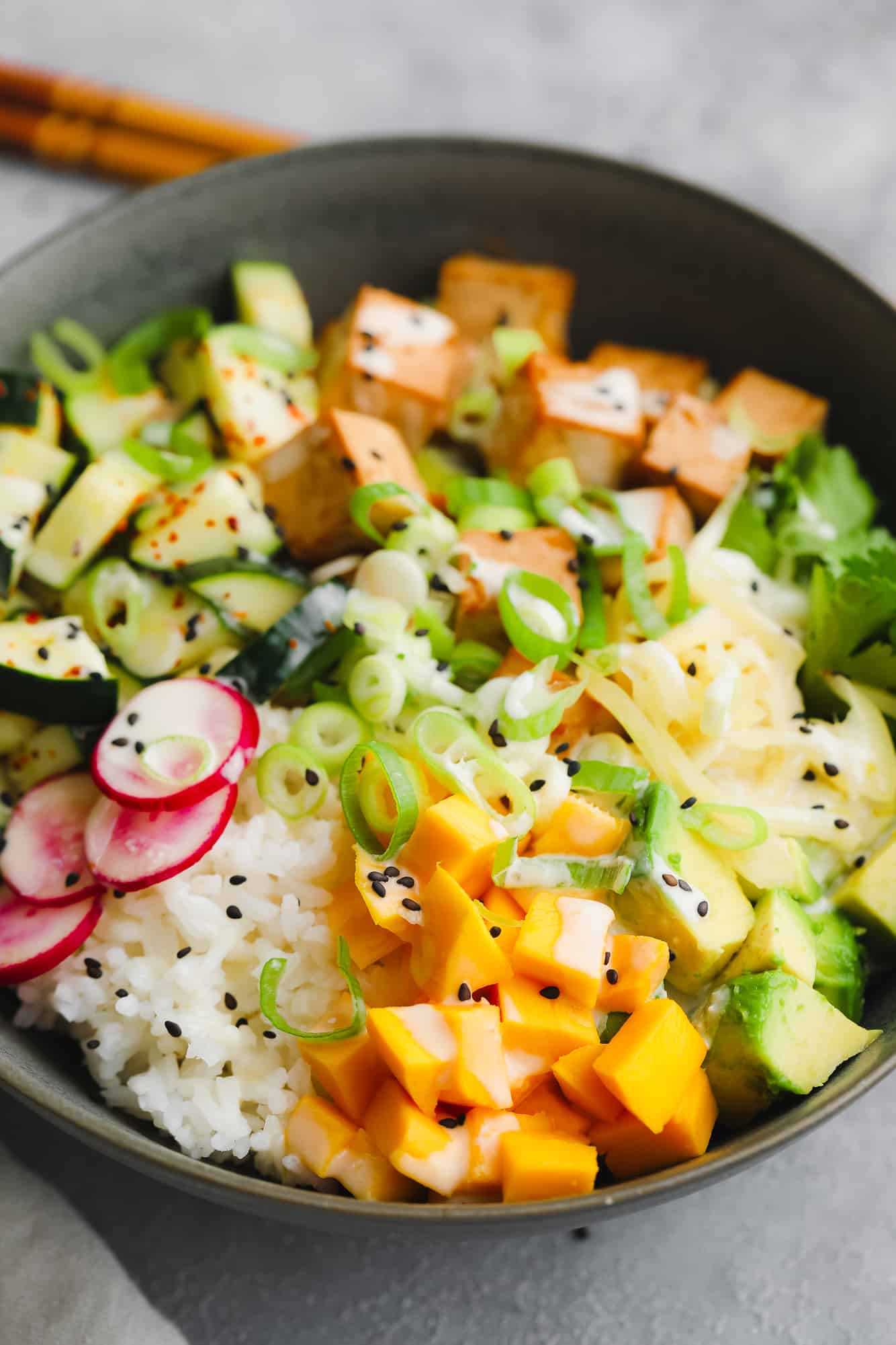 close up on a loaded vegan poke bowl.