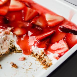 square image of strawberry dessert in pan