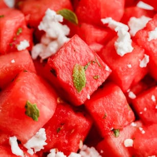 square image of bowl of watermelon salad with mint and feta