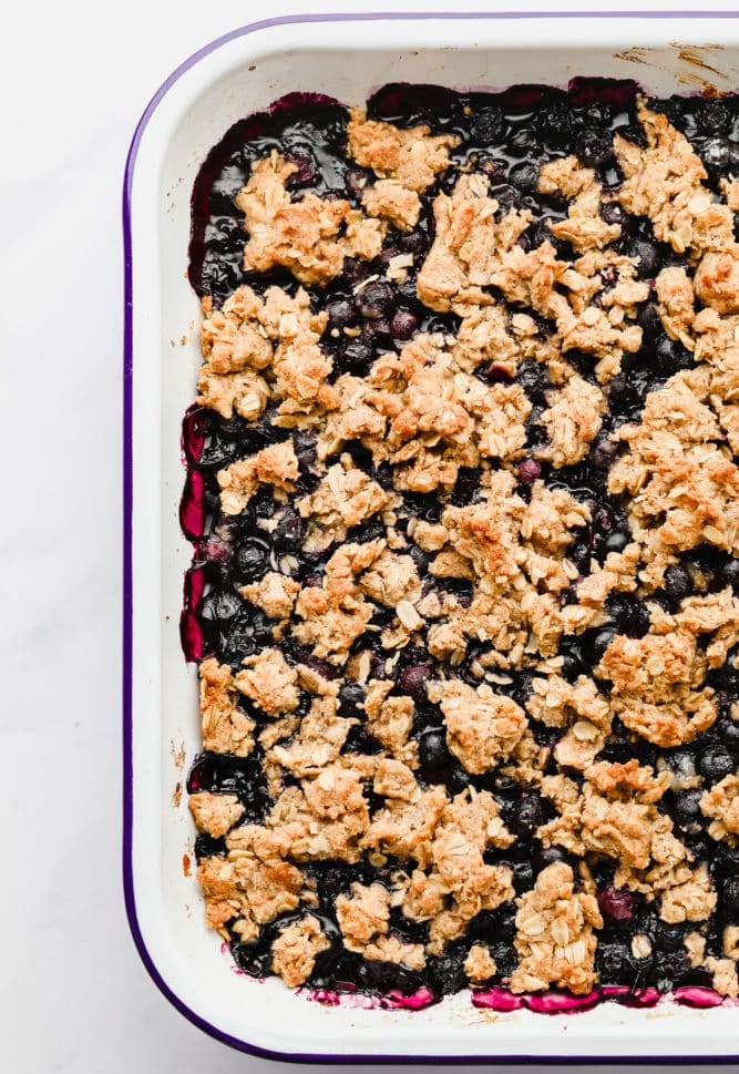 dish full of cooked blueberries and oat crisp