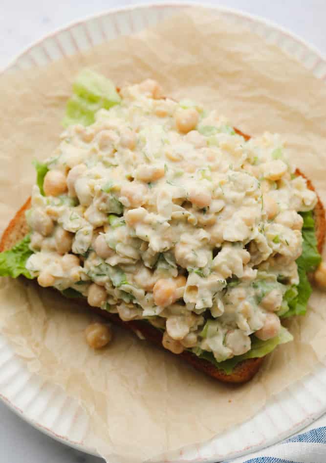 chickpea spread on a piece of bread with lettuce