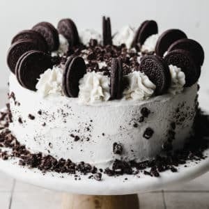 whole cake with oreos and white frosting on top