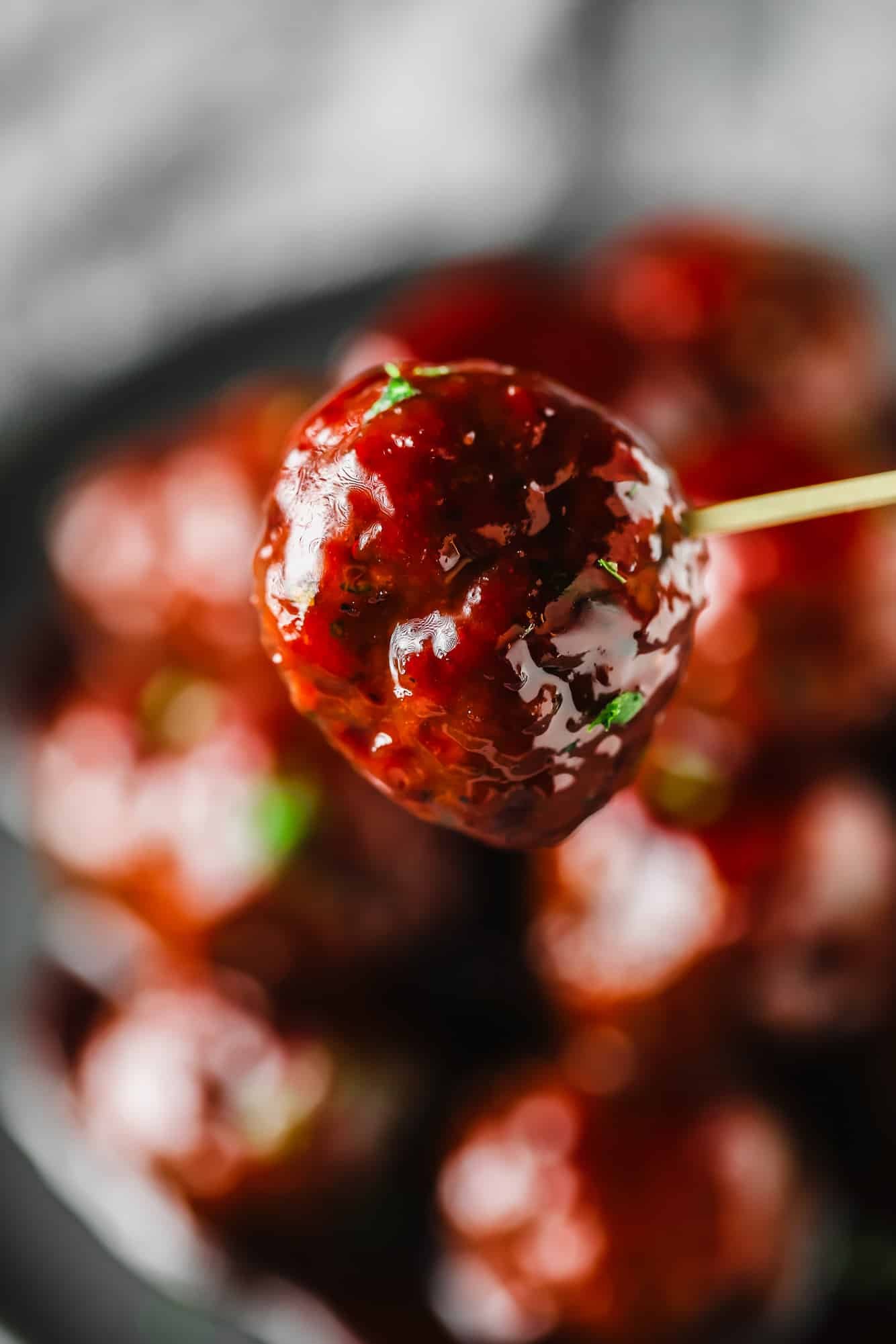 close up on a vegan grape jelly meatball.