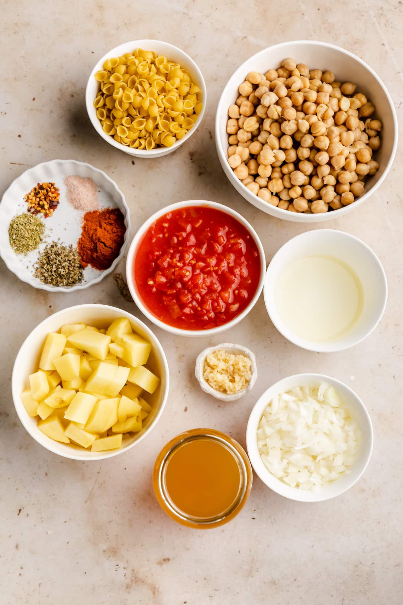 ingredients for Italian chickpea soup in individual white bowls.