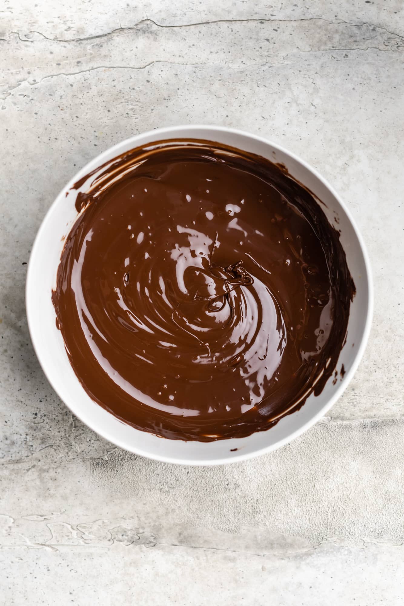 melted chocolate in a large white bowl.