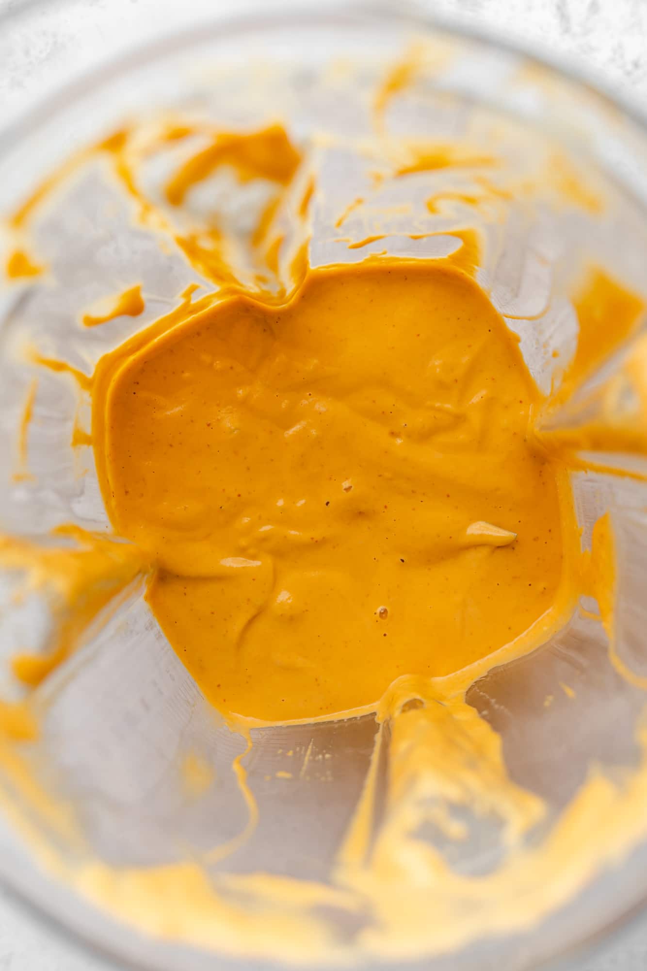 Blend orange chipotle sauce in a blender.