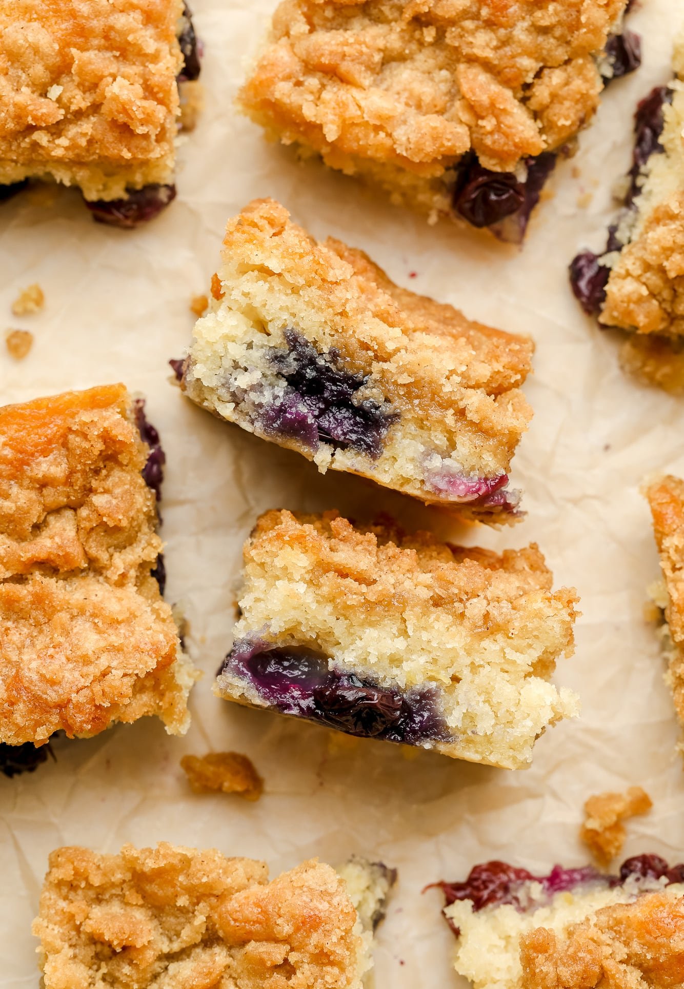 small slices of blueberry coffee cake turned on their sides.