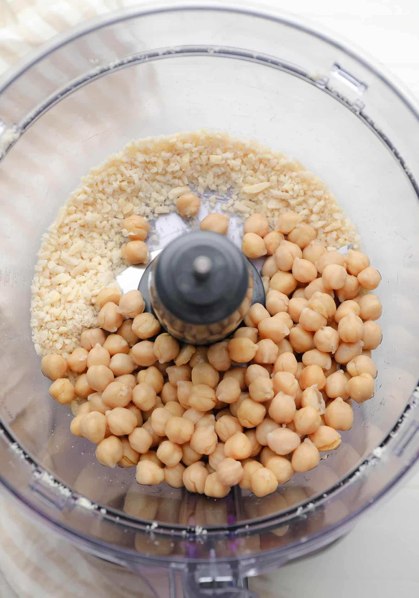chickpeas and crushed almonds in a food processor.