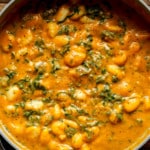 close up on a pot of cooked pumpkin gnocchi.