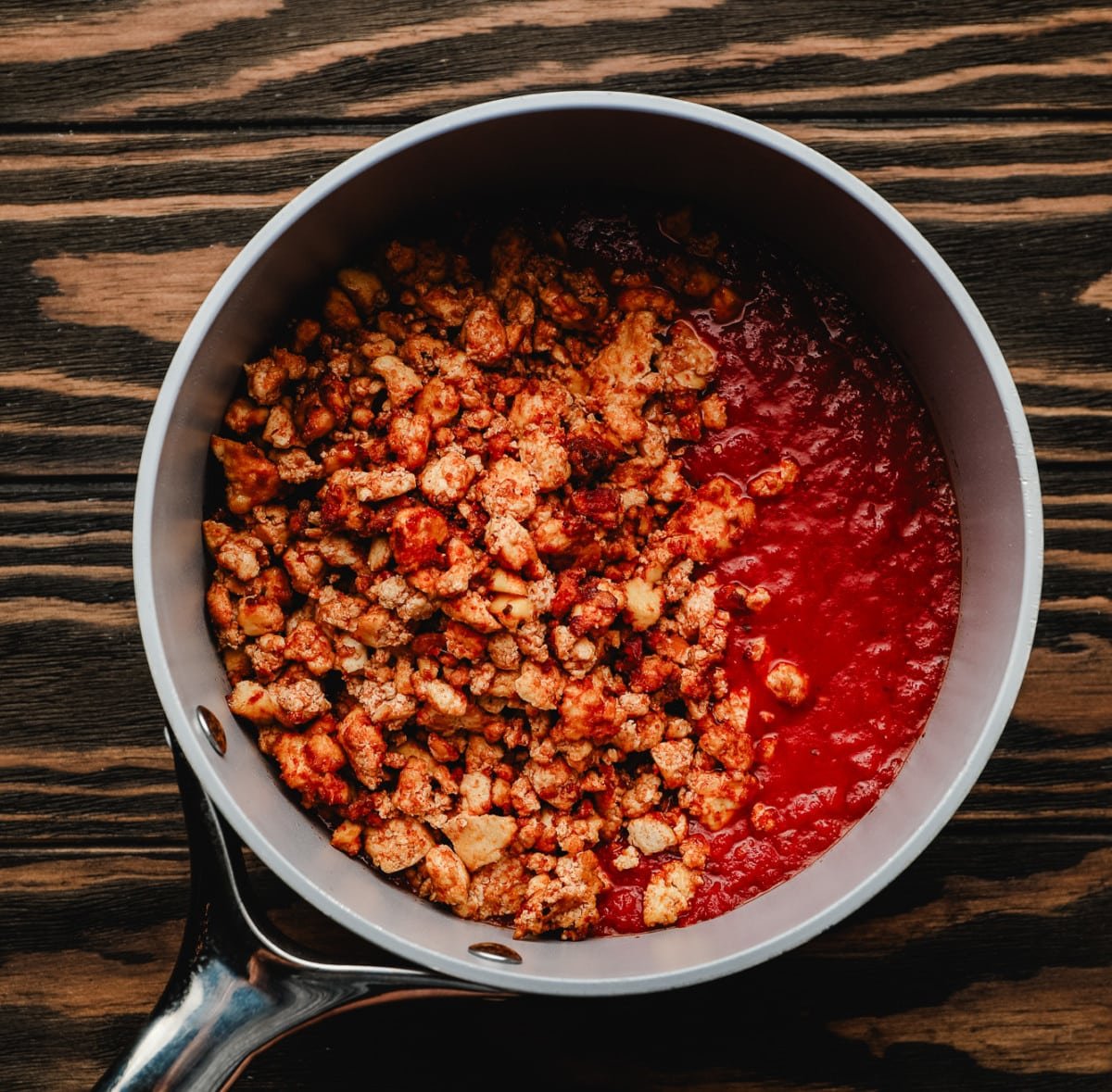 small grey pan with marinara and tofu crumbles