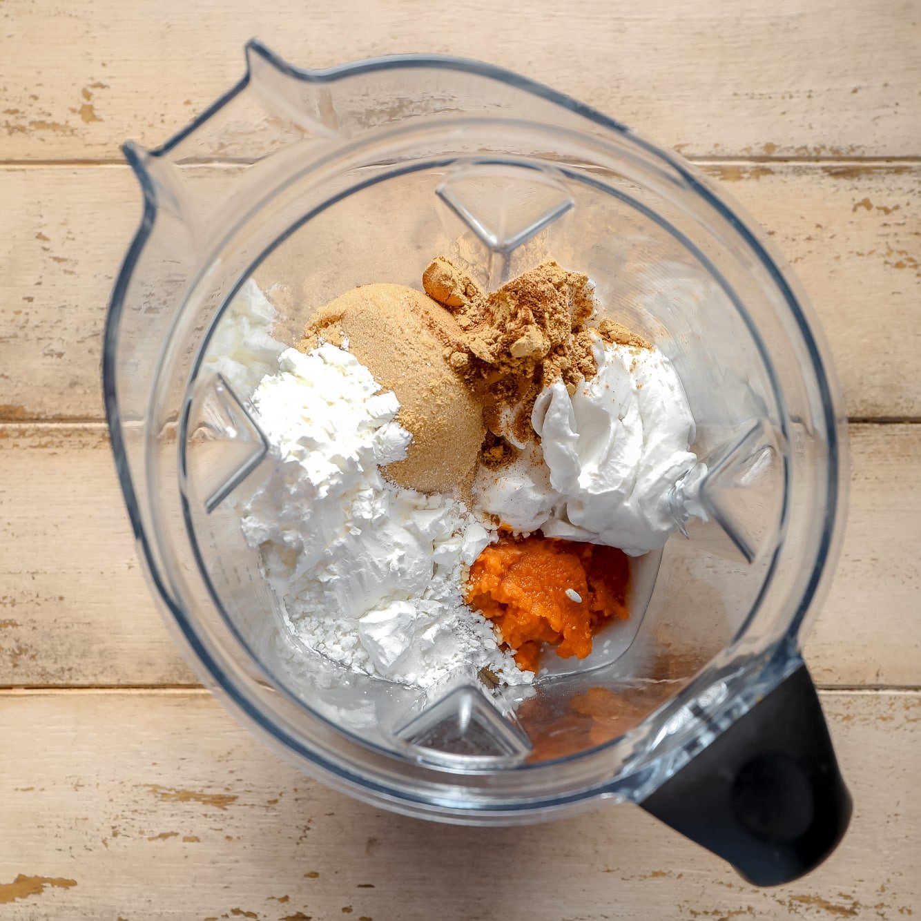 pumpkin pie filling ingredients in a blender.