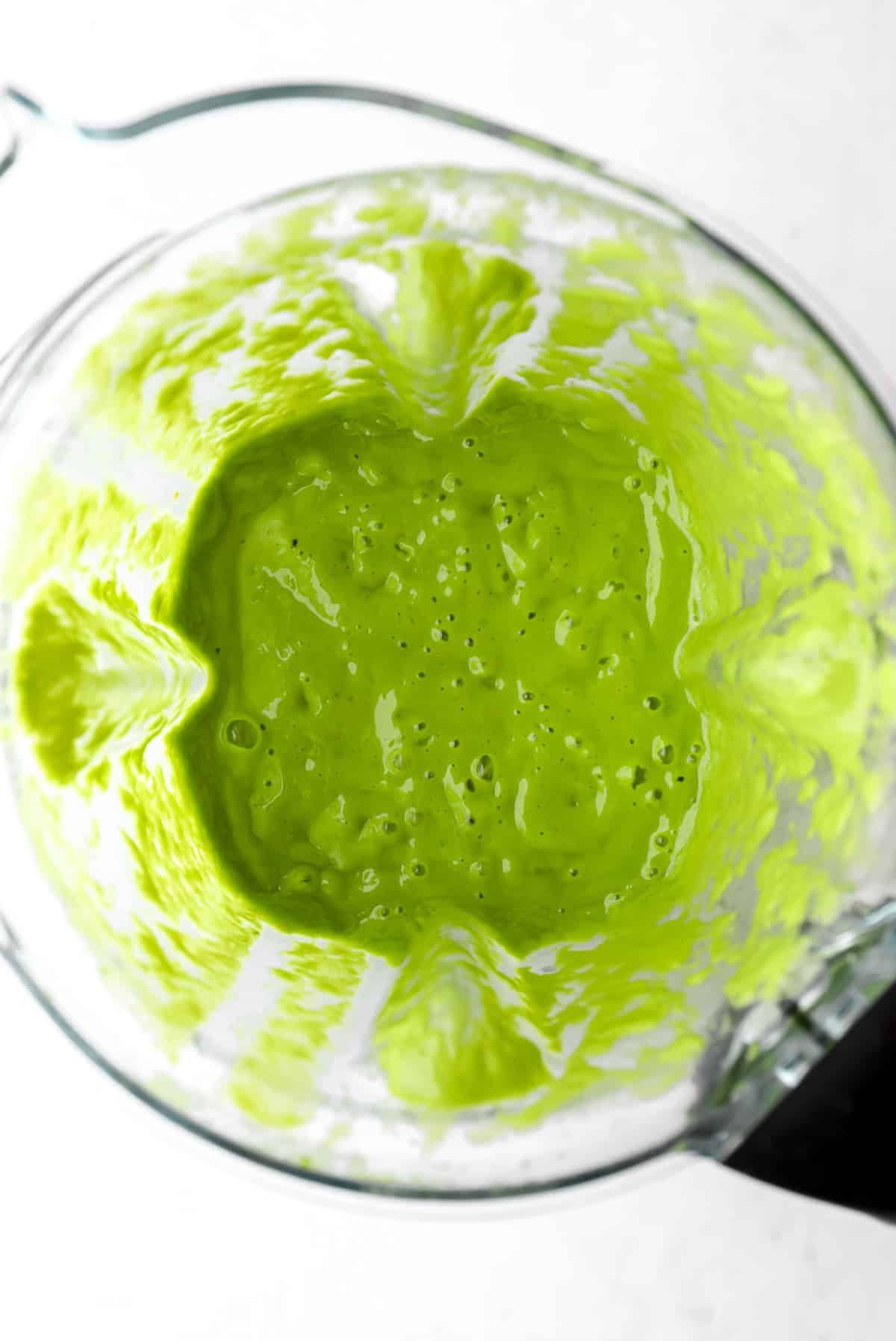 green smoothie blended in blender