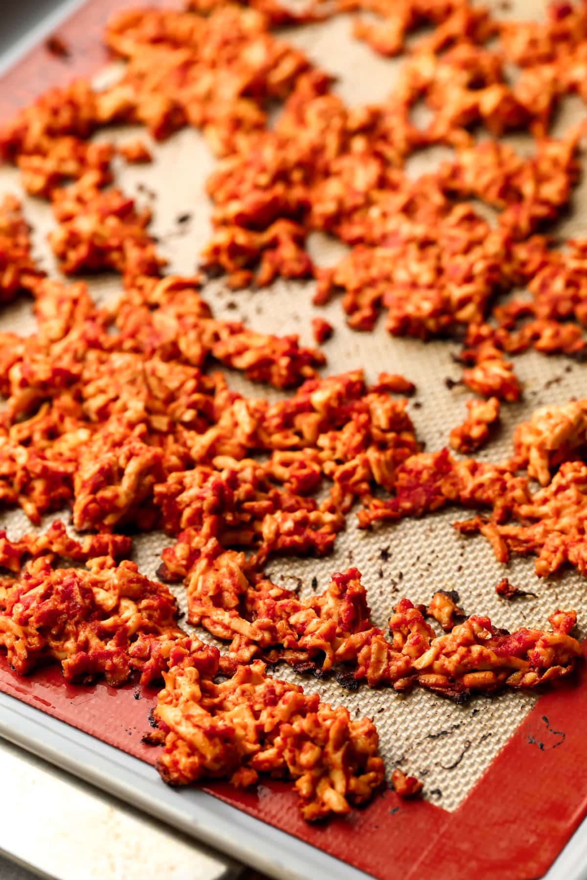 tofu crumbles baked on a silicone lined pan