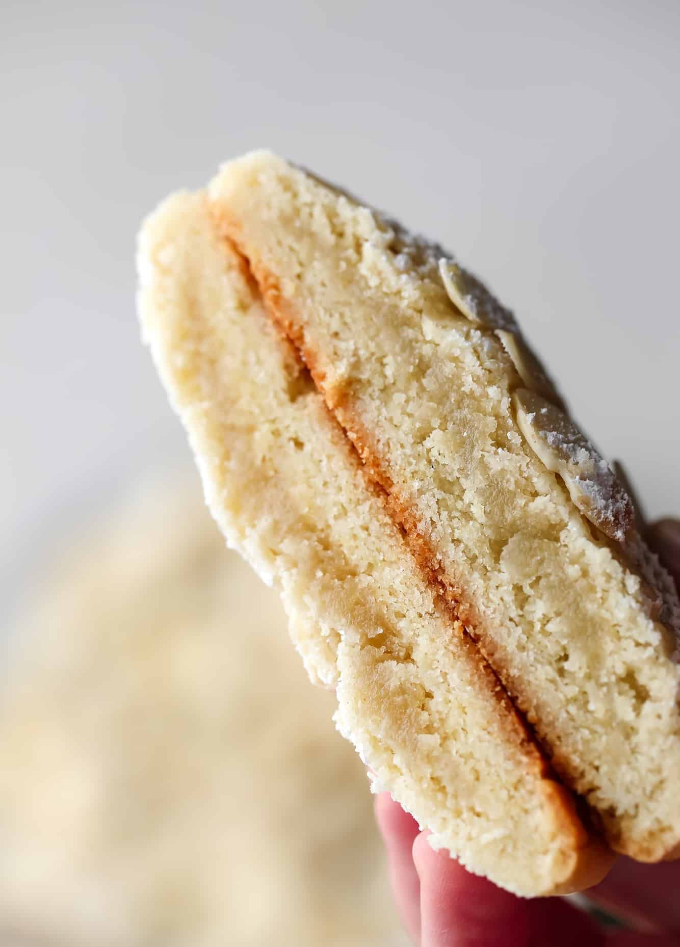 close up of a Vegan Almond Croissant Cookie cut in half.